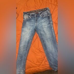 Rock Revival Blue Boot Cut Jeans with Natural Fading